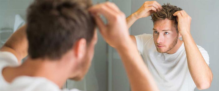 Treatment of hair loss with finasteride tablets